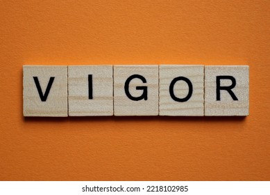  Gray Word Vigor Made Of Wooden Square Letters On Brown Background
