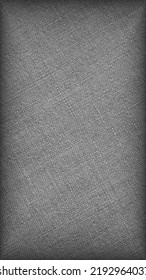 Gray Woven Surface Close-up. Linen Textile Grey Texture. Fabric Net Black And White Background. Textured Braided Len Backdrop. Mobile Phone Wallpaper With Vignetting. Macro