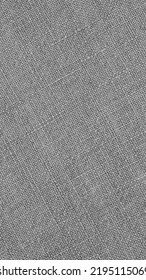 Gray Woven Surface Close-up. Linen Textile Grey Texture. Fabric Net Black And White Background. Textured Braided Len Backdrop. Mobile Phone Wallpaper. Macro