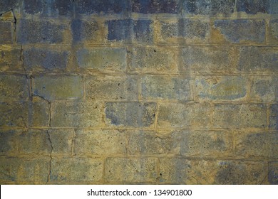 Gray And Yellow Cinder Block Wall Background