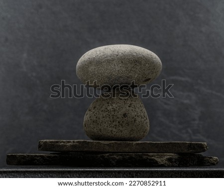 gray zen stone with shadow on dark gray background for podium background
