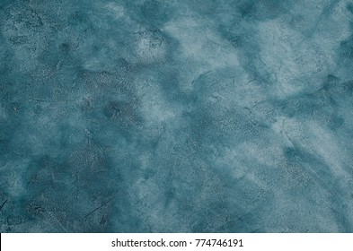 Gray-blue marble or cracked concrete background (as an abstract background or marble or concrete texture)