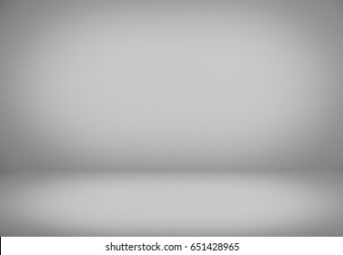 Gray,Empty Interior dark Backdrop cement wall Room,Blurry Soft Light Blank Background,Flat Floor,well use as Show for Montage or Display Products or text on background,Blur Circular White Grey Light.