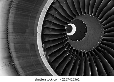 A Grayscale Closeup Of An Airplane Turbine Blades