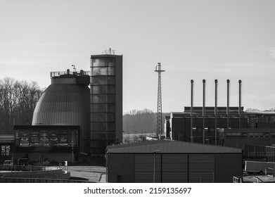 A Grayscale Shot Of An Old Industrial Factory