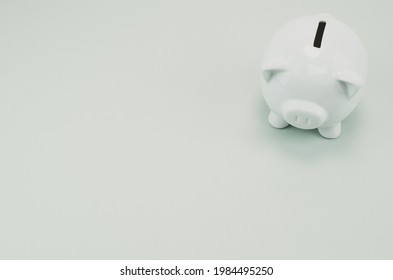 A grayscale shot of a piggy bank - Shutterstock ID 1984495250