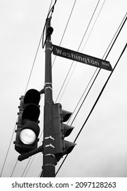 A grayscale shot of a street light in Washington
