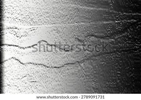 Grayscale sonar scan of subsurface layers with irregular wavy striations fading into darkness