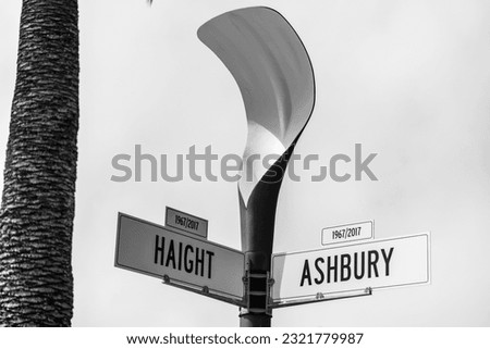 A grayscale of street signs of Haight in 1967-2017 and Ashbury in 1967-2017, before and after concept
