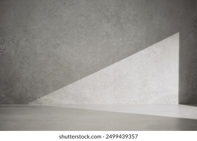A gray-toned tile background with various props with sunlight coming through the window.