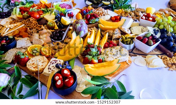 Grazing table with meats\
fruit cheese 