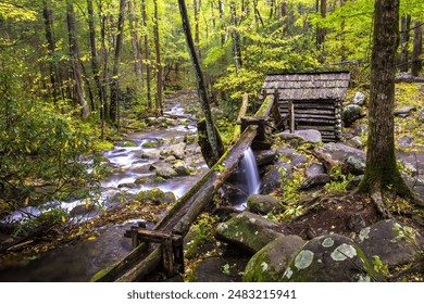 Grear Smoky Mountains National Park, Tennessee - Noah Bud Ogle homestead, hollowed-log flume divert water flow to a tub mill, from LeConte Creek - Powered by Shutterstock