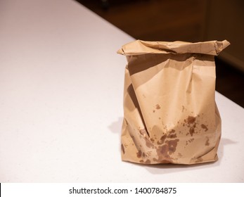 Greasy Brown Paper Bag On Counter