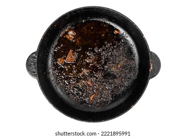  A Greasy Dutch Oven. Dirty Frying Pan Isolated On White.