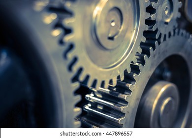 Greasy gears in the machine. - Shutterstock ID 447896557