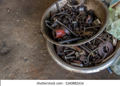 Greasy Tools On Dirty Ground