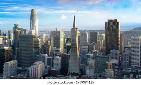 Great aerial view of San Francisco skyline, famous buildings over a cloudy sky. Financial district with its skyscrapers. California, United States.
