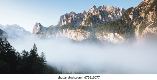 Great azure alpine lake Vorderer Gosausee. Picturesque and gorgeous morning scene. Salzkammergut is a famous resort area located in the Gosau Valley in Upper Austria. Dachstein glacier. Beauty world. - Powered by Shutterstock