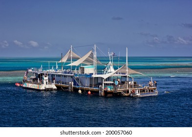 GREAT BARRIER REEF, AUSTRALIA - October 14,2013: Staff Perform End-of-day Tasks On The Reefworld Pontoon. Visitors Can Snorkel, Dive, Ride A Semi-submersible Or Stay Overnight Under The Stars.