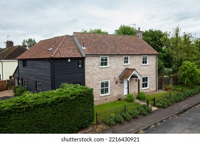 Great Bradley, Suffolk, England - May 19 2017: Modern Detached Brick House With Small Landscaped Garden.