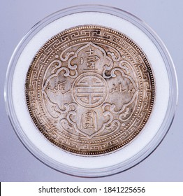 Great Britain British silver coin 1 one trade dollar 1899, face value in Chinese and Arabic within oriental ornaments, in a coin capsule to protect it and keep it in mint condition. 