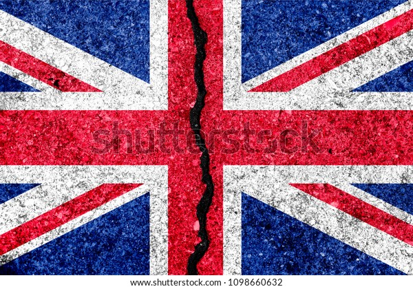 Great Britain\
flag, known as Union Jack, painted on cracked wall\
background/Brexit divided Britain\
concept
