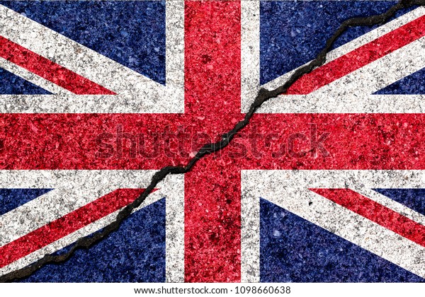 Great Britain\
flag, known as Union Jack, painted on cracked wall\
background/Brexit divided Britain\
concept