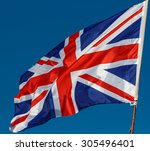 Great Britain Flag with wrinkles and seams expanded in the breeze