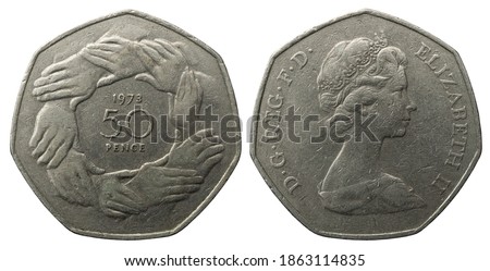 Great Britan 50 Pence coin macro isolated shot, year 1973. Circle of hands and Elizabeth II embossed on it.