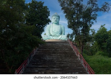The Great Buddha (Daibutsu) on the grounds of Wat Phra That Doi Phra Chan  Temple  in lampang Thailand