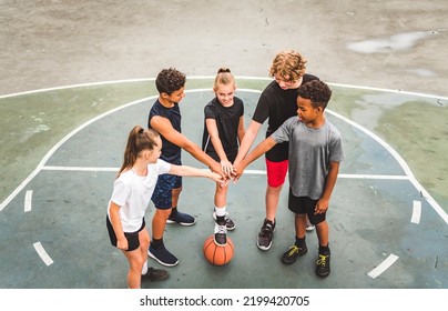 A great child Team in sportswear playing basketball game - Powered by Shutterstock