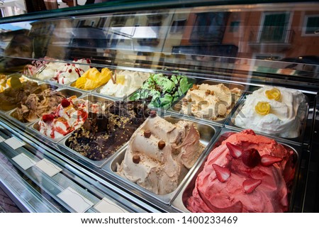Great choice of ice cream. Italian gelateria. Ice-cream cafe, show window with sweeties.