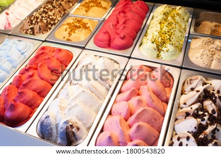 Great choice of ice cream. Italian gelateria. Ice-cream cafe, show window.