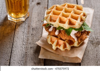 Great choice for a lunch: a glass of cold beer in the combination with interesting burger - Belgian waffles with a chop, mayo and fresh salad.