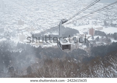 great city view from top view of Mount Hakodate Ropeway in snow winter season everything cover by white snow Hokkaido japan