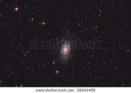 Great colorful galaxy in constellation of Camelopardalis
