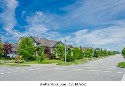 Great And Comfortable Neighborhood. Line, Row Of The Houses On Empty Street In The Suburbs Of Vancouver, Canada.