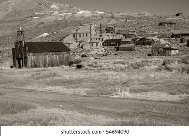 The Great Depression Black And White From An Old Western Ghost Town In California America. Bodie Historical National Park Usa.  Mining Factory And Firehouse In Main Picture.