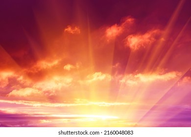 Great dramatic view. Clouds illuminated by the setting sun. Mystical lighting. Meditative calmness and greatness. Colorful sunset in the evening sky. Amazing sky panorama.