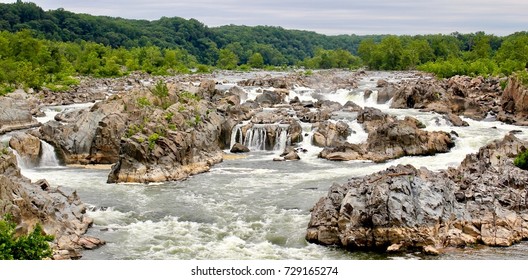Great Falls is a series of rapids and waterfalls on the Potomac River, 14 miles (23 km) upstream from Washington, D.C., on the border of Montgomery County and Fairfax County