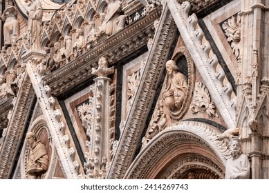 Great gothic portal of the Siena Cathedral in Italy - Powered by Shutterstock