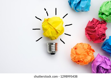 Great Idea Concept With Crumpled Colorful Paper And Light Bulb On White Background