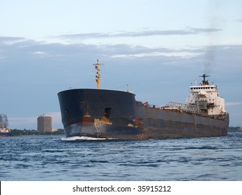 Great Lakes Freighter Making It's Way Up The Saint Clair River You Can See Sarnia Ontario To The Left Of The Ship.