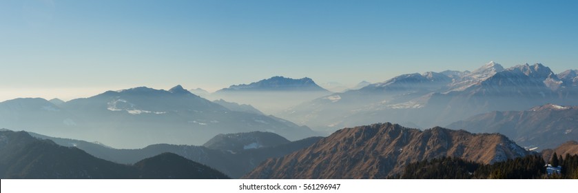 Great landscape on the Orobie Alps in winter dry season. Panorama from Monte Pora, Bergamasque Prealps Bergamo, Italy.