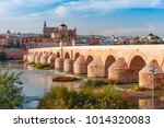 Great Mosque Mezquita - Catedral de Cordoba and Roman bridge across Guadalquivir river in the morning, Cordoba, Andalusia, Spain