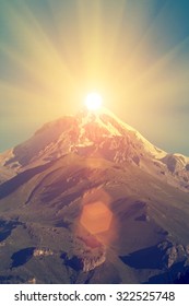 Great Mountain Peak With Sun