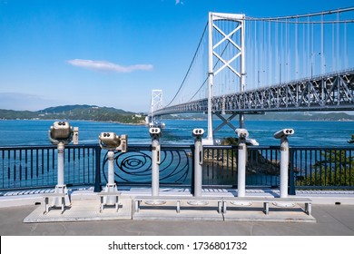 Great Naruto Bridge is a Large Suspension Bridge over the Tide of the Naruto Strait, Naruto City, Tokushima Prefecture, Japan. The city of Naruto is synonymous with “whirlpools”. - Powered by Shutterstock