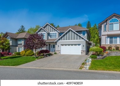 Great Neighborhood. Row Of The Houses, Homes On The Empty Street In The Suburbs Of Vancouver, Canada.