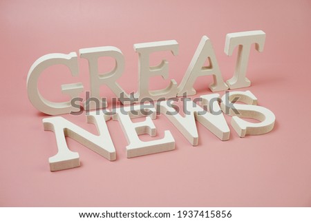 Great News word alphabet letters on pink background
