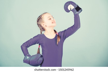 With Great Power Comes Great Responsibility. Boxer Child In Boxing Gloves. Rise Of Women Boxers. Female Boxer Change Attitudes Within Sport. Free And Confident. Girl Cute Boxer On Blue Background.